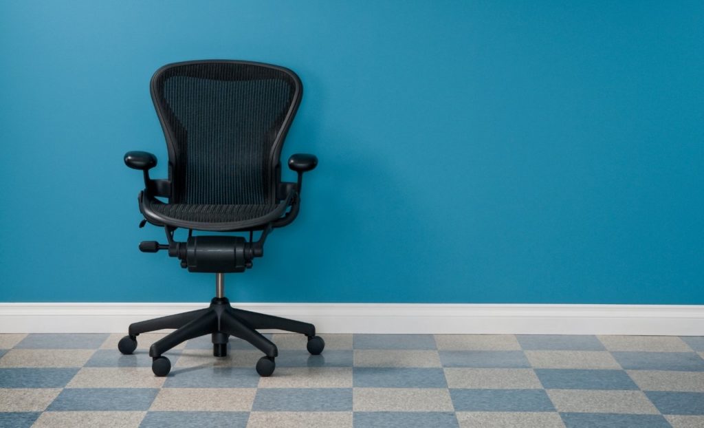 Minimal Aeron Chair on Blue Background